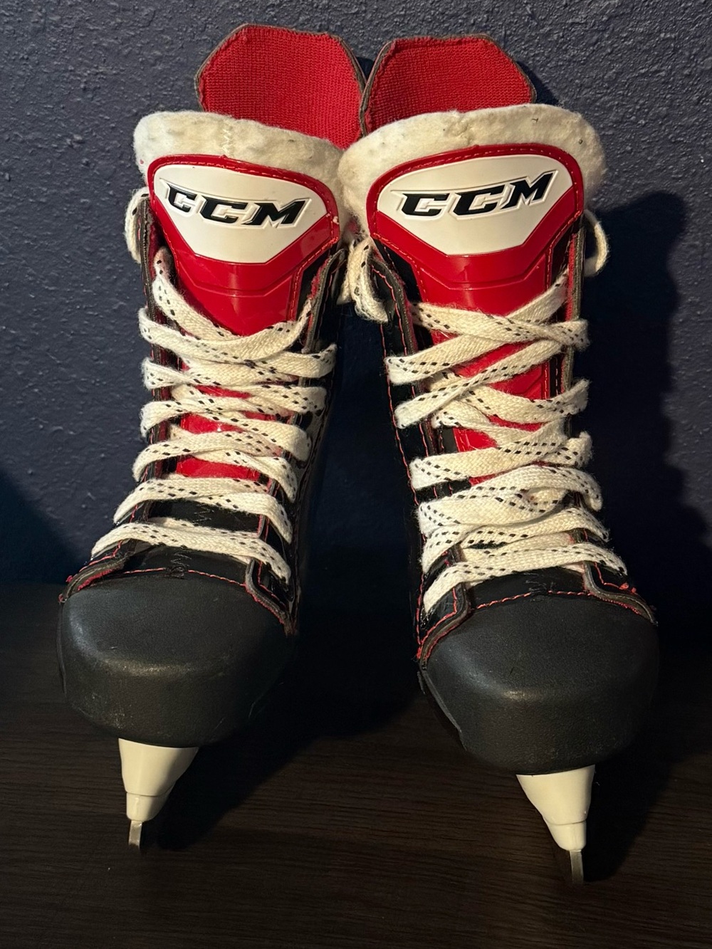 CCM Youth Black and Red Ice Skates